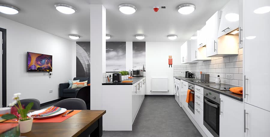 Kitchen area in modular building built for students to live through university time.